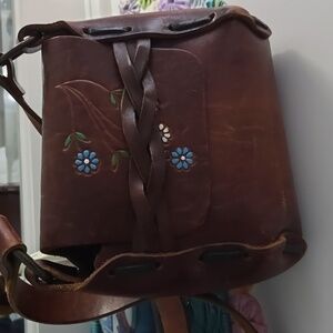 Vintage 70s tooled and painted leather purse.